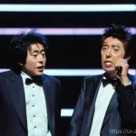 다운타운 일본 개그 듀오  역사 - **Prompt 1: Dynamic Duo on Stage**
    "A vibrant, high-energy image of the legendary Japanese comed...